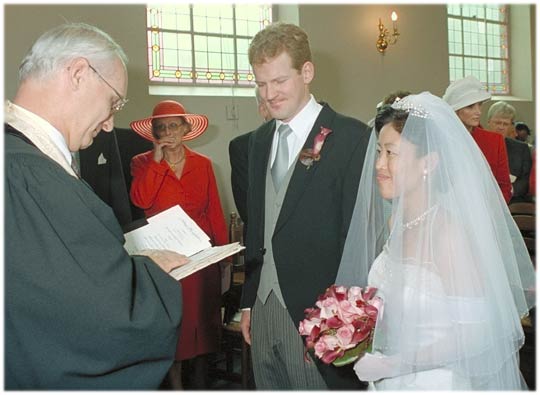 Standing front of the pastor